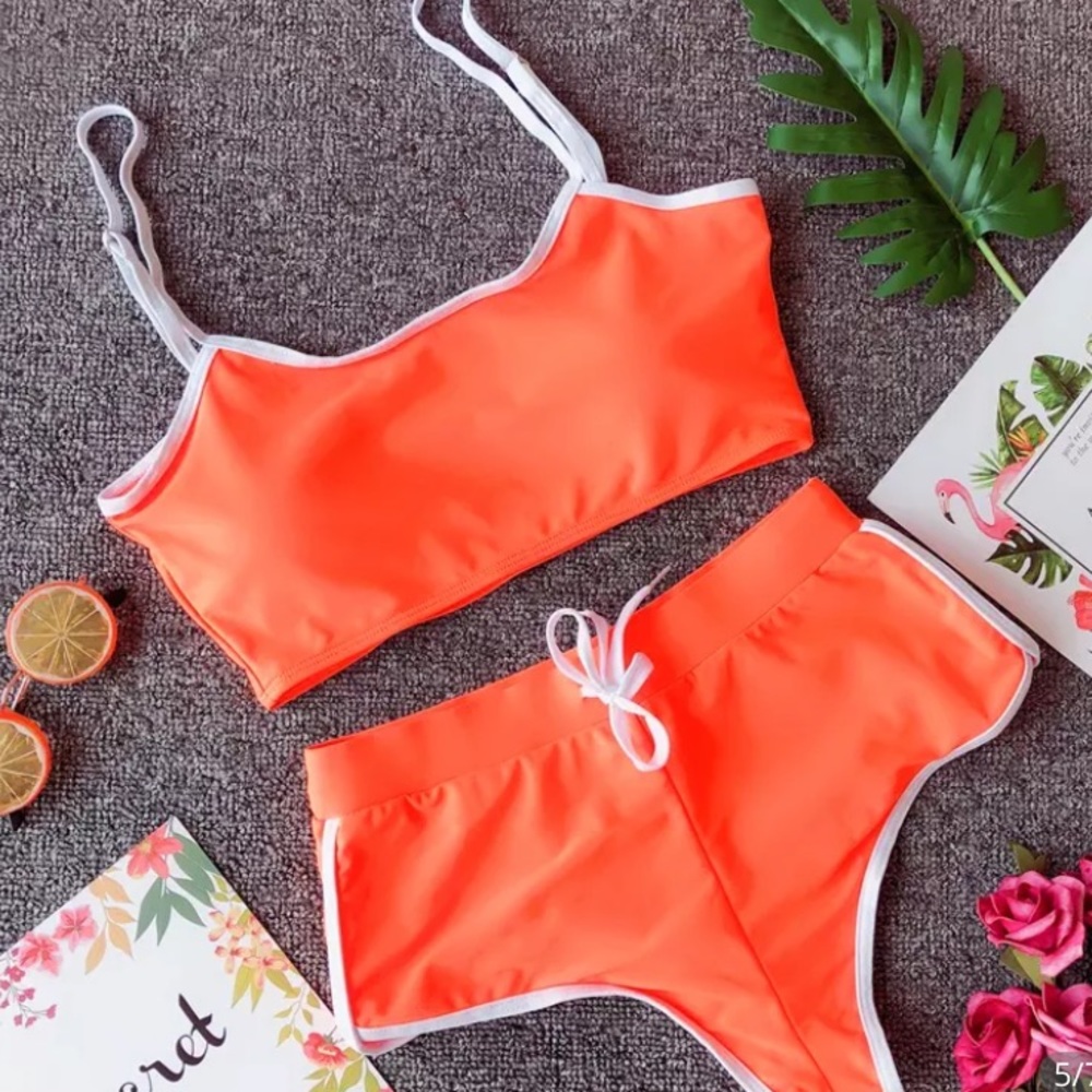 Orange athletic bikini shorts and sports bra